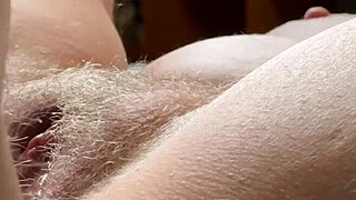 Close up and personal look at a hairy pussy in slow motion