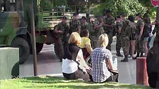 Public threesome near the Eiffel Tower in Paris, France