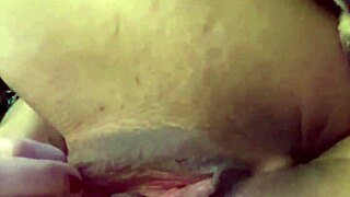 Close up of a puffy and tattooed clit vibrating until orgasm