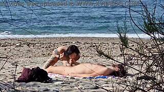 Small tits amateur couple enjoys passionate beach sex