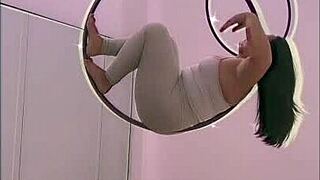 See how this bisexually inclined slut performs a pole dancing routine with the help of her heels and aerial hoops