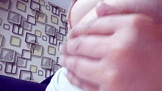 A girl with big natural tits - she likes to play with them
