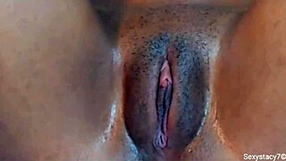 Cute Jamaican girl rubs her fat cameltoe through her panties, causing quite a stir