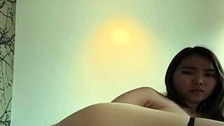 Asian princess masturbates wet pussy