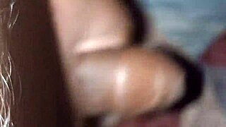 Homemade amateurs perform handjob in their private space.