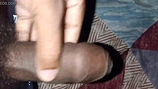 Homemade amateurs perform handjob in their private space.