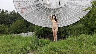 Public Nude Shoot Near Old Space Radar with Brunette Natural Tits.