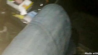 Young woman delivers intense handjob to man on crowded public street