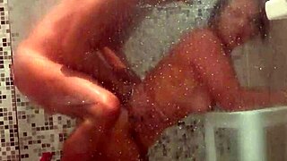 wife gives blowjob in shower