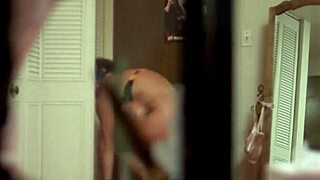 Sexy Brunette Cheerleader Undresses in Pool