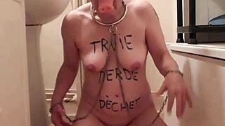 the female slave conducts a self-submission session, embracing her whore slut side in bdsm mode