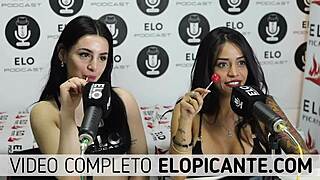 Bisexual lesbians kiss passionately while playing with lollipop