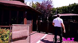 tattooed petite brunette hangs out in the family pool outside.