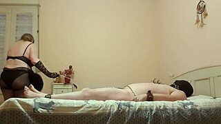 Domination slave bedded by his mistress in femdom blowjob.