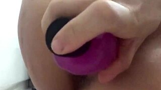 I insert chinese balls into her vagina with vibrator