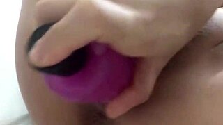 I insert chinese balls into her vagina with vibrator