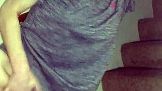 wife teases with pierced pussy while rubbing on the stairs.