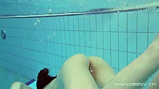 Roxalana Cheh Explores Underwater as a Czech Redhead