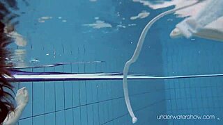 Roxalana Cheh Explores Underwater as a Czech Redhead