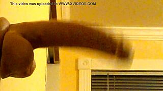 Gay Guy in Hood Deepthroats Dildo Intensely