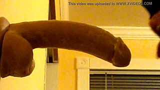 Gay Guy in Hood Deepthroats Dildo Intensely