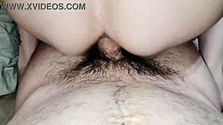 Wife rides husband in quick anal session, reaching orgasm together.