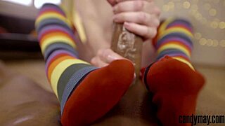 Candy May plays with big black cock in socks. I-I mean, handjob fun! So interracial... 😳