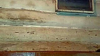 gay man with painted lips stuffs butter up his tattooed ass