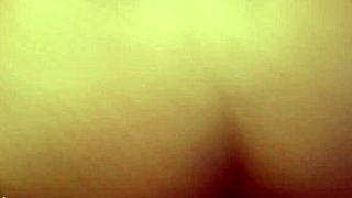 The black top cums on the white bottom's ass during interracial encounter.