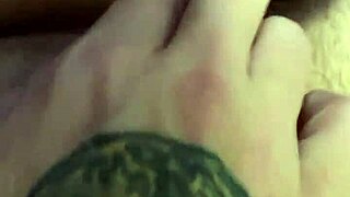 He helps her play with her pussy, fingering the clit in close-up.