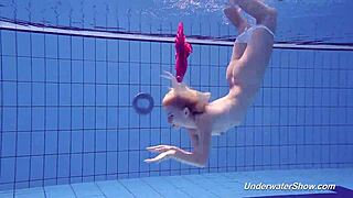 Proklova strips bikini and swims nude in pool, blonde teen bathing.