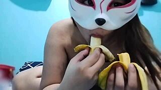 The busty asian babe indulges in a fruit fetish, using a banana for pleasure