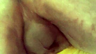 A gay stud enjoys close-up anal play with big dildos, leading to lactation