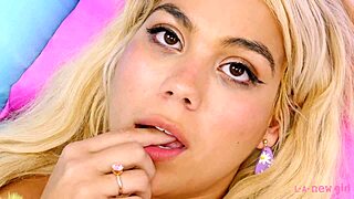 Blonde beauty bares all in close-up photoshoot mystery