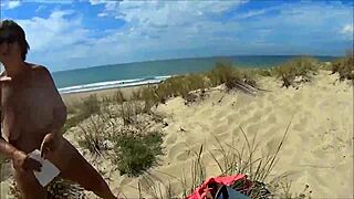 Suzisoumise turns heads as a public beach figure in daring outdoor scenes.