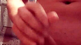 Young gay guy gives intense handjob to huge cock cumming massively