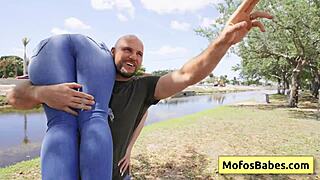 Petite blondie seduced near lake by muscular bald dude