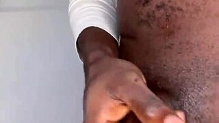 Watch this ninja man stroke his monster cock and cum?