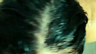 Japanese babe eagerly sucks cock while parents sleep nearby.