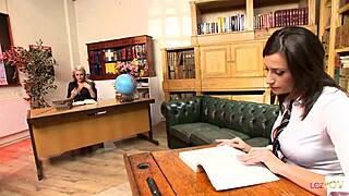 Nerdy lesbian decides to strapon fuck her sexy blonde colleague.