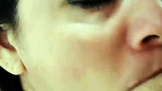 Japanese babe eagerly sucks cock while parents sleep nearby.