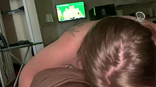 She's giving that big black cock a sloppy blowjob