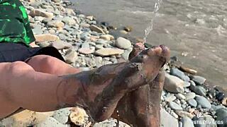 Goddess Teases With Messy Nylon Feet On River Bank