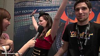 Fionna and Jimmy perform a Chaturbate video at the AE Expo with big tits