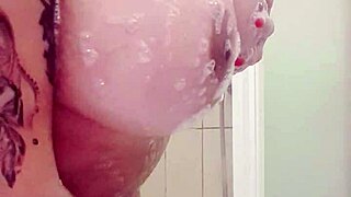 sexy babe enjoys shower with big tits and ass