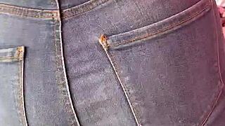 Big ass woman in jeans at the tianguis in Mexico