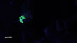 Carrie B Engages in Intense Blacklight Sex Scene, Sucking and Choking on Cock with Small Tits