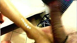 Mistress intensely busts balls and makes him cum on her feet.