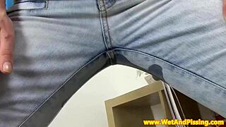 babe with piss fetish pees through her denim pants