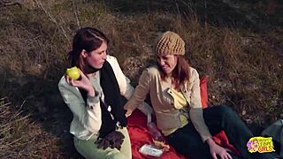 Picnic turns wild as brunette friends strap on for outdoor lesbian fun. Kissing leads to raw action.